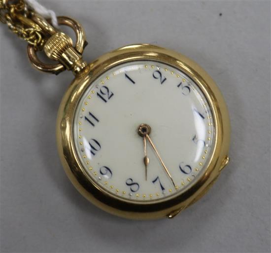 An 18ct gold fob watch on a gilt metal chain.